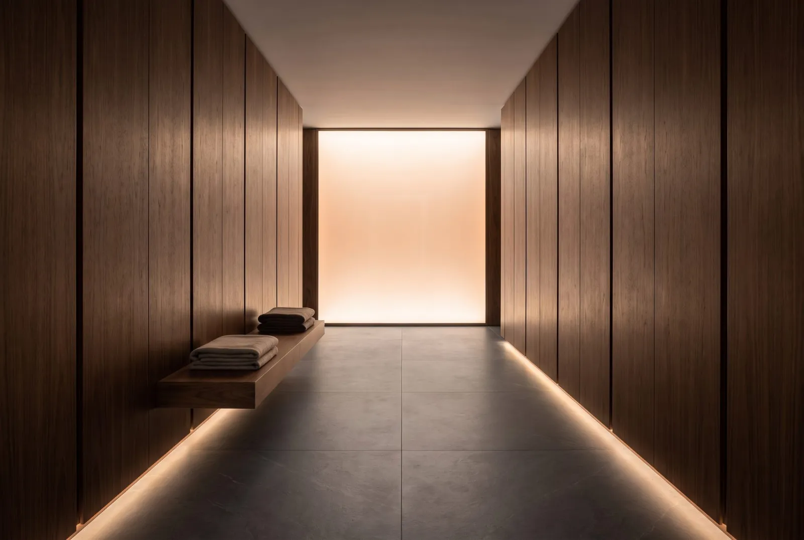 A walnut corridor ending in a tall glowing light panel